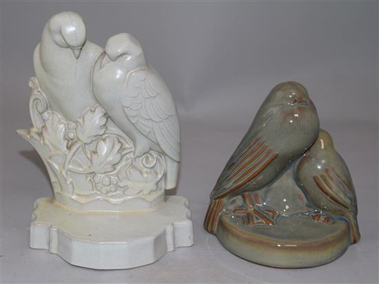 A pair of Poole Pottery Lovebirds bookends and another similar bookend, largest 7.75in.